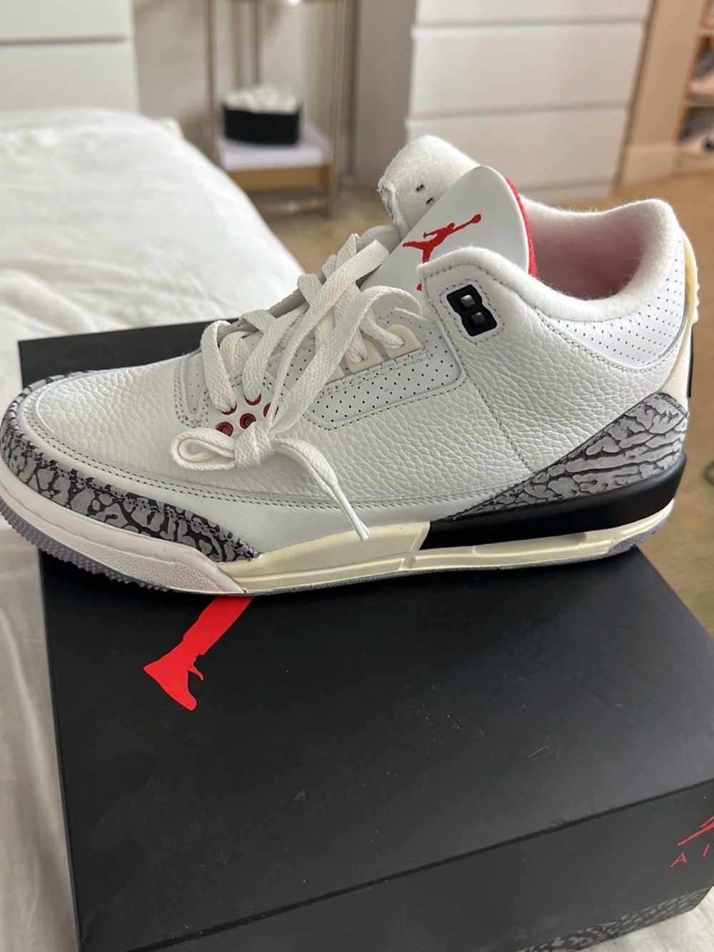 Jordan Men’s White/Black/Cement Grey Retro Sneakers